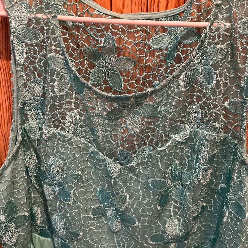 Adorable dress I bought for a wedding, only worn the one time. Torrid size 24